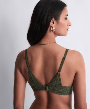 Woman wearing a green bral
