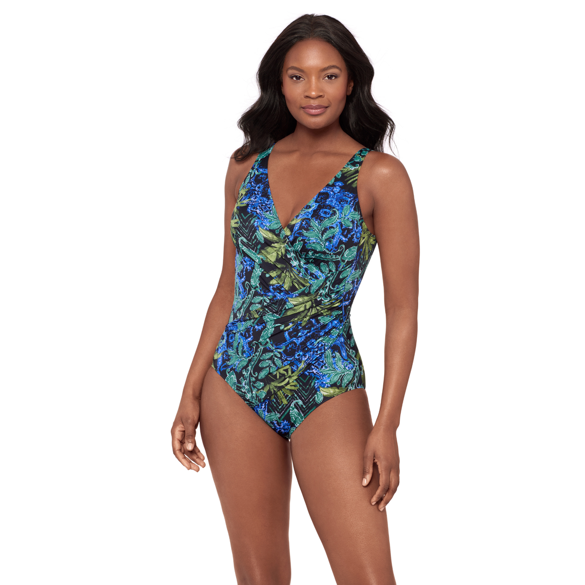 Woman wearing a blue floral one-piece swimsuit on a white background