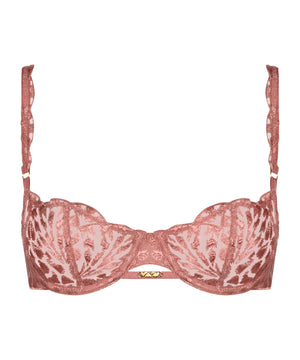 Pink lace bra on a white background