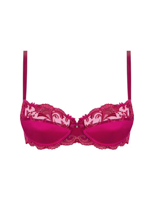 Pink lace bra on a white background