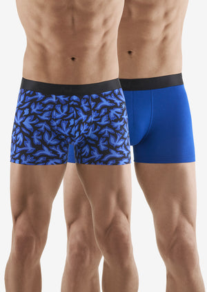Two pairs of blue boxer briefs, one with a pattern and one solid, on a white background.